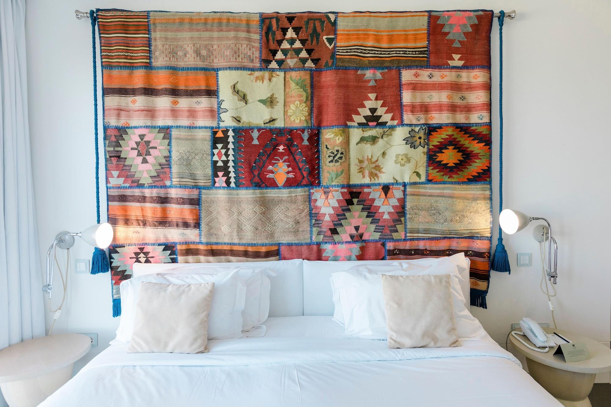 Evolutee Hotel Obidos Exterior photo A bed with a headboard